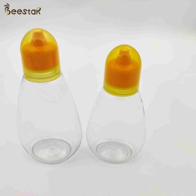 주문 250 밀리람베르트 350 밀리람베르트 500 밀리람베르트 꿀단지와 스푼 플라스틱은 달콤한 저장을 위한 꿀병을 비웁니다 온라인 제품