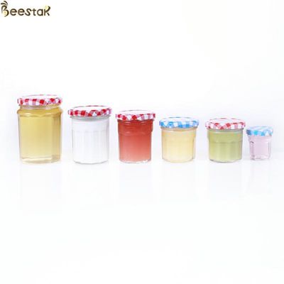 주문 얇은 나사 금속 뚜껑을 가진 150ml 200ml 250ml 380ml 꿀 단지와 숟가락 넓은 입 온라인 제품