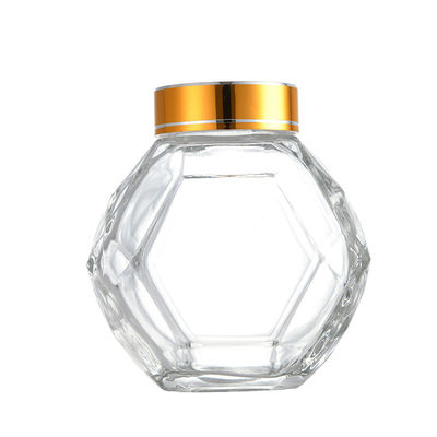 주문 황금은 빨간 까만 금속 뚜껑을 가진 200ML 380ML 유리제 육각형 꿀 병 온라인 제품